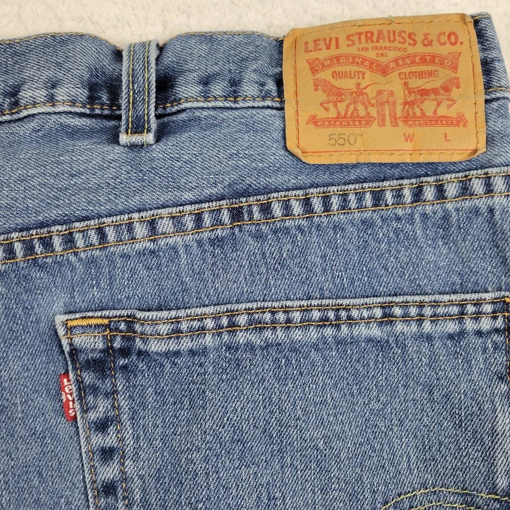 Levis‎ 550 Jeans Mens 52x32 Blue Denim Relaxed Tapered Leg Water Less Distressed